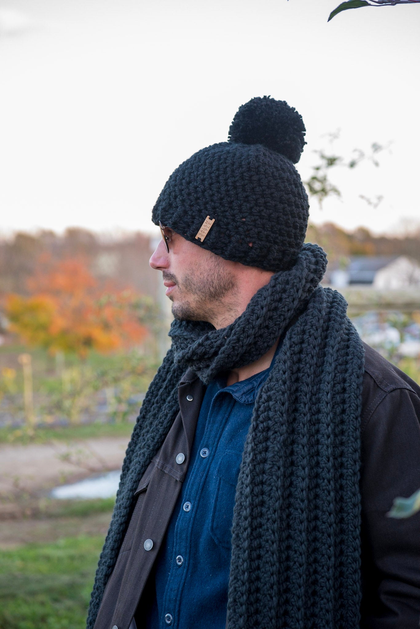 The Winter Island Pom Pom Hat in Black