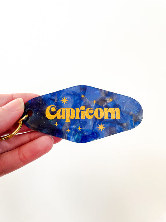 Capricorn Zodiac Motel Keychain