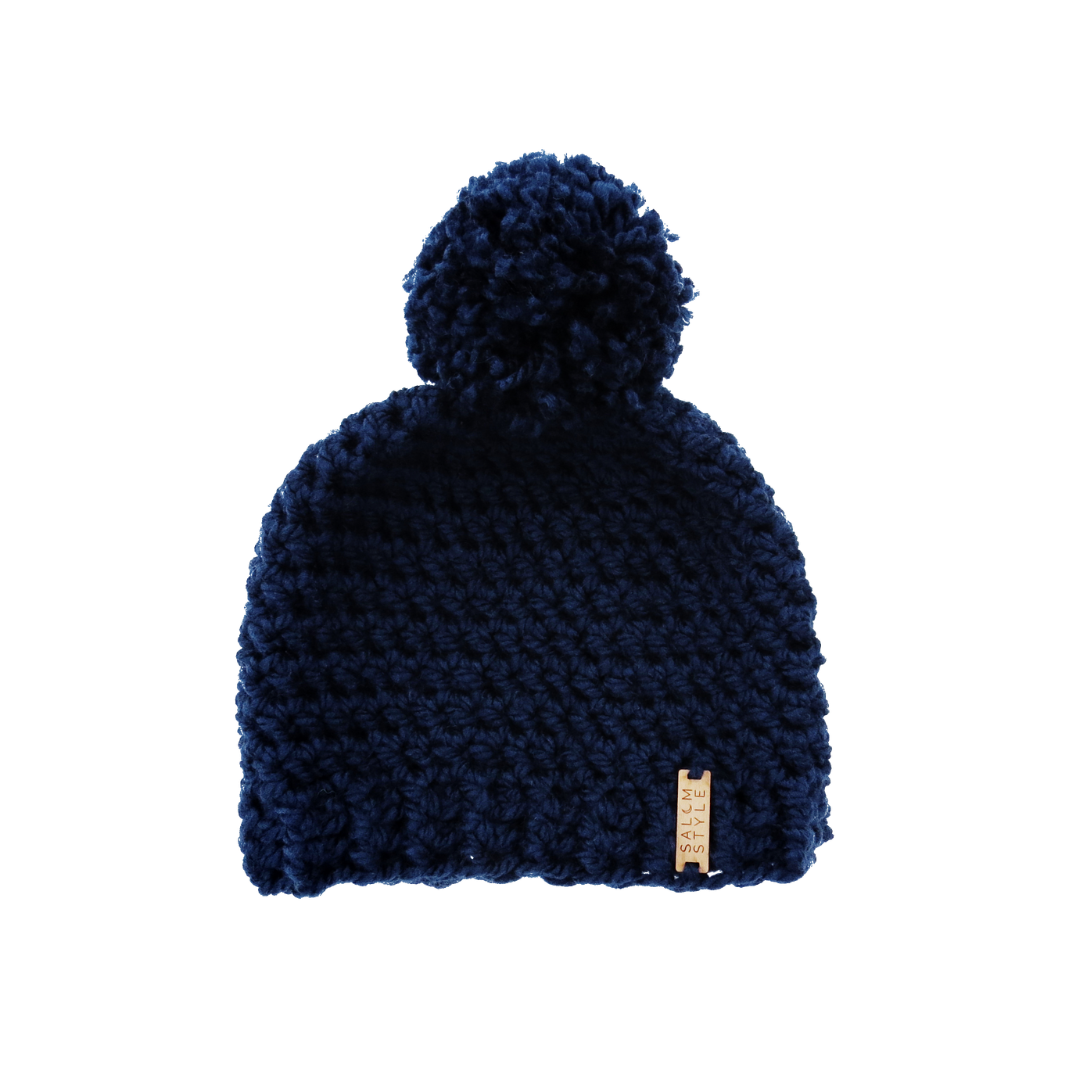 The Winter Island Pom Pom Hat in Navy Blue