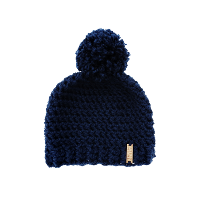 The Winter Island Pom Pom Hat in Navy Blue