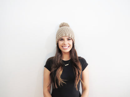 The Winter Island Pom Pom Hat in Beige