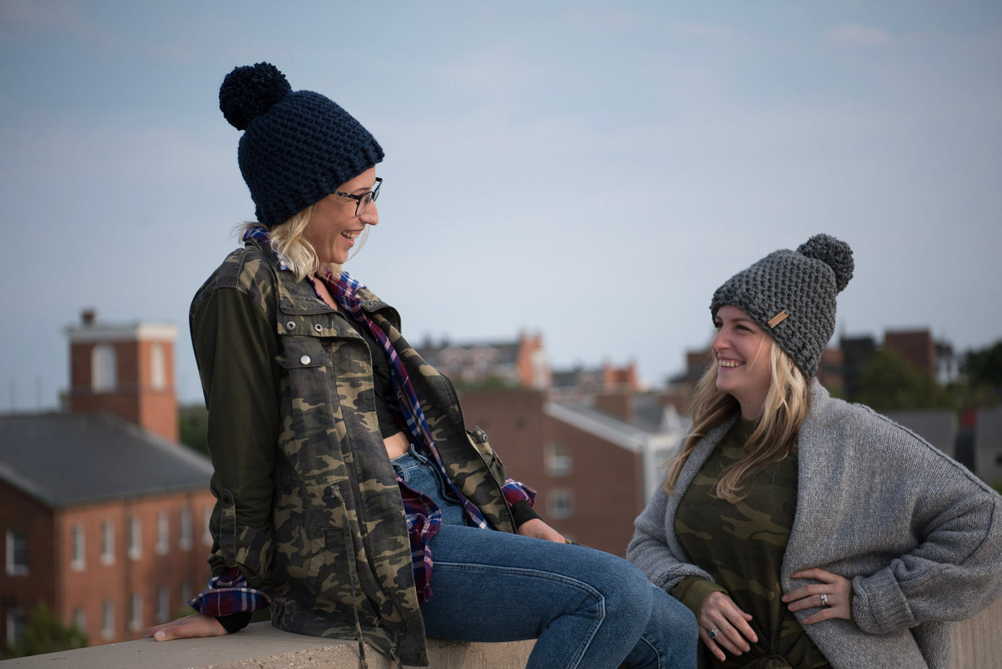 The Winter Island Pom Pom Hat in Navy Blue
